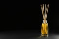 Reed air freshener on black background Royalty Free Stock Photo