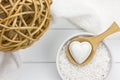 Reed ball, wooden spoon with bath bomb and towel Royalty Free Stock Photo