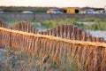 Reed fence on beautiful beach in Vadu