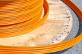 Reel for cable conduits for fibre optics for ADSL connection for Royalty Free Stock Photo