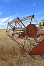 Reel and canvas of combine ending wheat into a combine