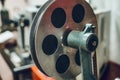 Reel with film of old projector close-up. Outdated cinema. Royalty Free Stock Photo