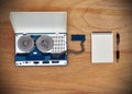 Reel tape recorder and blank notepad Royalty Free Stock Photo