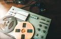 Reel tape recorder for wiretapping. Field telephone set USSR is lying nearby.  KGB spying conversations Royalty Free Stock Photo