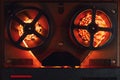 Reel to reel audio tape recorder with orange led light strip Royalty Free Stock Photo