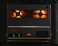 Reel to reel audio tape recorder with orange led light strip Royalty Free Stock Photo