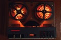 Reel to reel audio tape recorder with orange led light strip Royalty Free Stock Photo