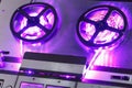 Reel to reel audio tape recorder with purple led light strip