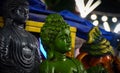 reen colored idol is made of Gautam Buddha