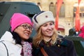 Reenactor woman and Asian tourist on the Red Square