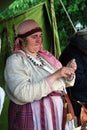 Reenactor woman shows her skills