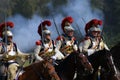 Reenactors cuirassiers ride horses at Borodino battle historical reenactment in Russia