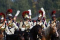 Reenactors cuirassiers ride horses at Borodino battle historical reenactment in Russia