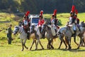 Reenactors dressed as Napoleonic war French soldiers ride horses