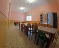 Refectory of the kindergarten with tables and chairs without the Royalty Free Stock Photo