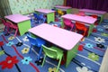 Empty tables . children`s furniture and toys in kindergarten Royalty Free Stock Photo