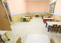 Refectory of a school for children with small chairs and tables