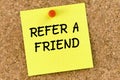 Refer a friend PostIt Note Pinned To Cork Board or corkboard