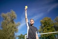 Referee on football field showing yellow card Royalty Free Stock Photo