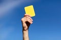 Referee on football field showing yellow card Royalty Free Stock Photo