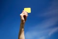 Referee on football field showing yellow card Royalty Free Stock Photo