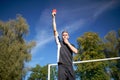 Referee on football field showing yellow card Royalty Free Stock Photo