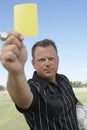 Referee Showing Yellow Card To Warn A Player Royalty Free Stock Photo