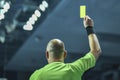 Referee shows yellow card