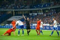 Referee shows a yellow card on the soccer game