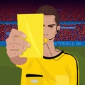 Referee whistling holds yellow card