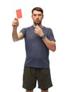 referee whistling whistle and showing red card Royalty Free Stock Photo