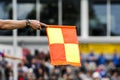 Referees assistant and flag Royalty Free Stock Photo