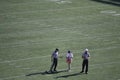 Referees Pause for a Water Break Royalty Free Stock Photo