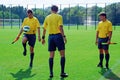 Referees play with ball Royalty Free Stock Photo