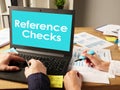 Reference Checks is shown on the business photo using the text