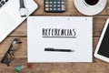 Referencias, Spanish text for Referrals on note pad at office de Royalty Free Stock Photo