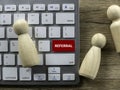 Referral Button Keyboard with Wooden People Figures Royalty Free Stock Photo
