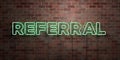 REFERRAL - fluorescent Neon tube Sign on brickwork - Front view - 3D rendered royalty free stock picture