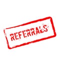 Referrals red rubber stamp isolated on white.