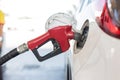 Refill and filling Oil Gas Fuel at station. Gas station refueling. To fill the machine with fuel. Car fill with gasoline at a gas Royalty Free Stock Photo