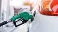 Refill and filling Oil Gas Fuel at station. Gas station - refueling. To fill the machine with fuel. Car fill with gasoline at a ga Royalty Free Stock Photo