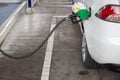 Refill and filling Oil Gas Fuel at station.Gas station - refueling.To fill the machine with fuel Royalty Free Stock Photo