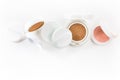 Refills of foundation and highlighter cushion on a white background Royalty Free Stock Photo