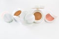 Refills of foundation and highlighter cushion on a white background Royalty Free Stock Photo