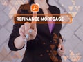 REFINANCE MORTGAGE text in search line. Modern Banker looking at smartphone