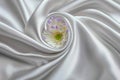 Refined backdrop grey satin cloth texture with subtle floral details