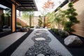 refined and minimalist garden with paths of pebbles and stepping stones