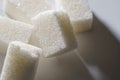 Refined sugar closeup on a white background Royalty Free Stock Photo