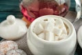 Refined sugar cubes in ceramic bowl on table Royalty Free Stock Photo