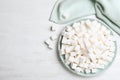 Refined sugar cubes on white wooden table. Space for text Royalty Free Stock Photo